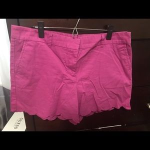 Scalloped fuschia shorts.
